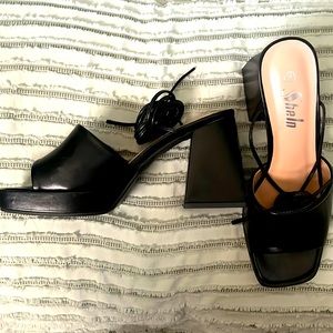 Black chunky tie heels